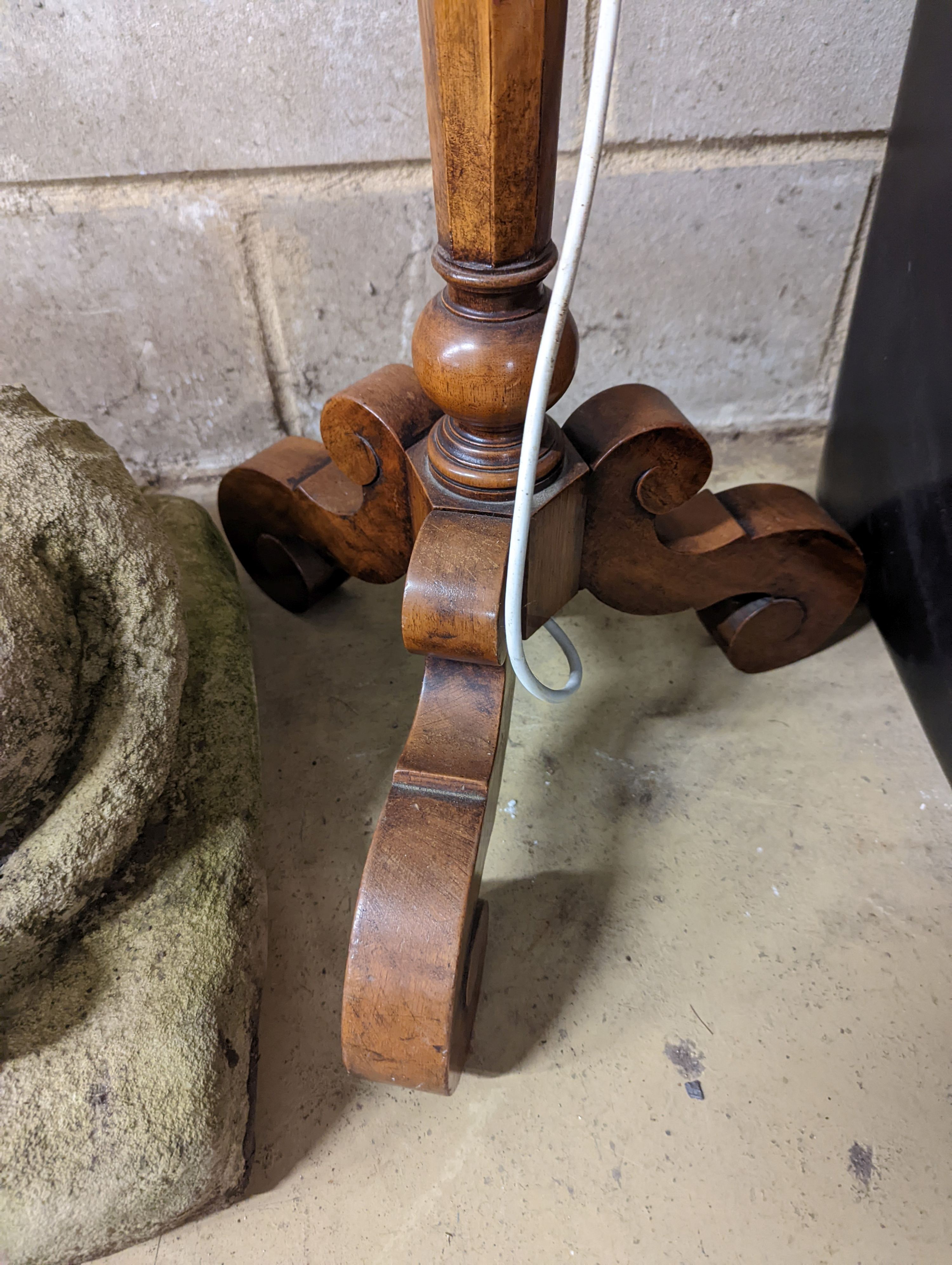 A 1920's Italian style burr walnut veneered tripod standard lamp, height 145cm